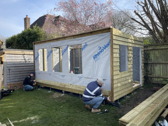 Shed walls with breathable membrane