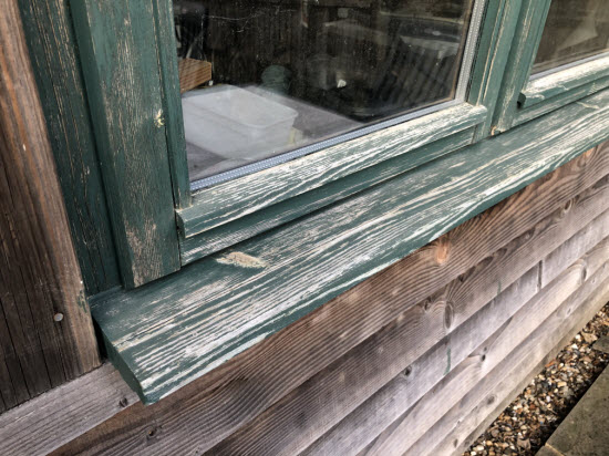 shed window in need of a coat of exterior woodstain
