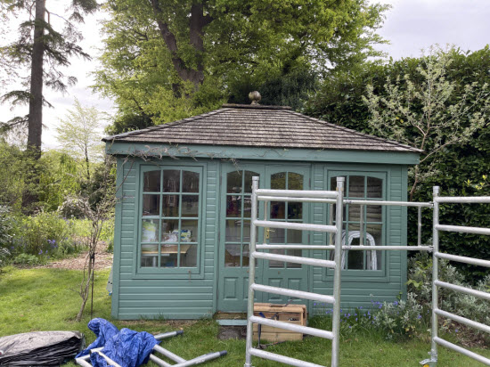 Malvern summerhouse with aging cedar roof