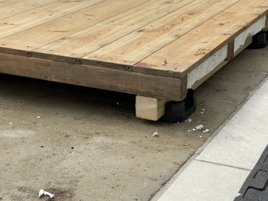 a typical shed floor stack of base, bearer, joist and floorboards