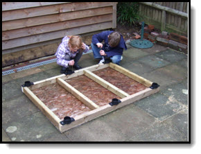 Adjustable shed foundation - plastic jacks