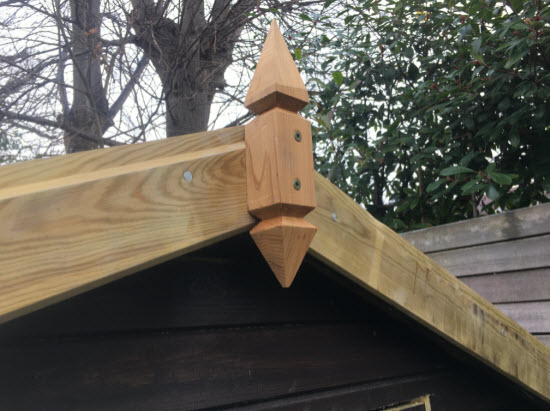 Tall pointed shed roof finial