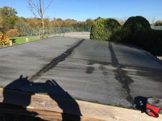 shed roof felt with repairs