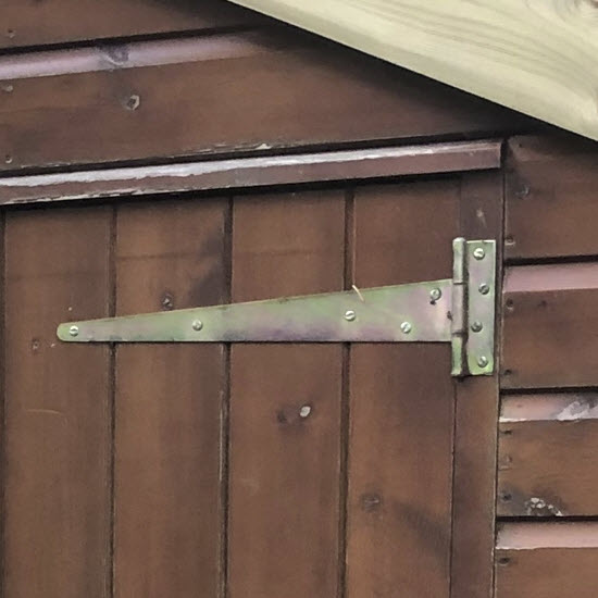 hinge installed with one-way screws