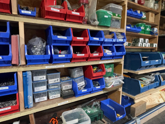 Toolshed shelves with storage bins